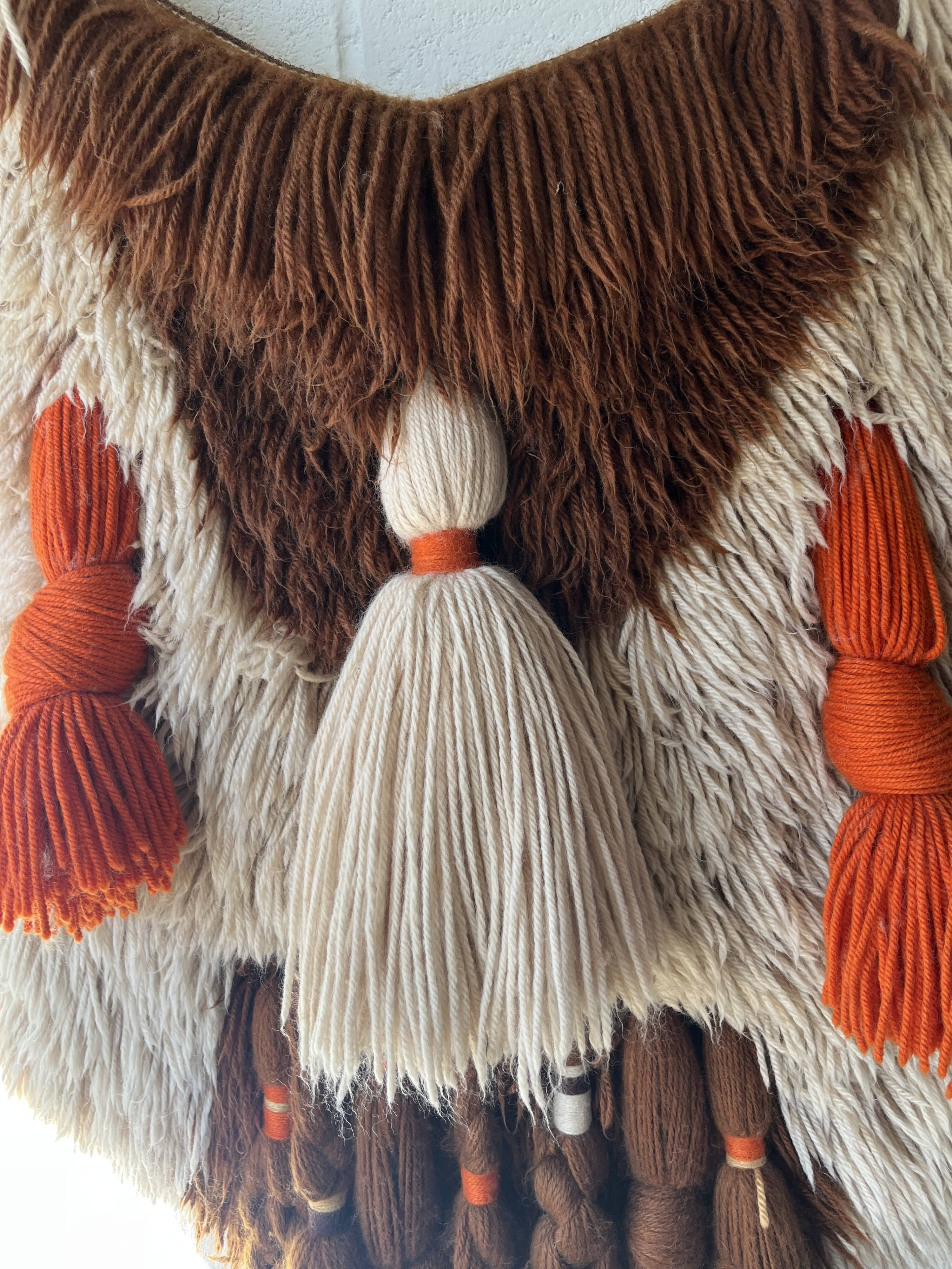 Handmade woven wool wall tapestry from the 70s and 80s, vintage macramé.