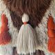 Handmade woven wool wall tapestry from the 70s and 80s, vintage macramé.