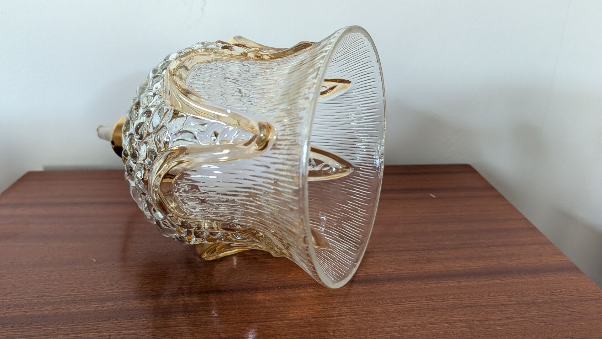 Bulged glass lampshade and 6 amber arches