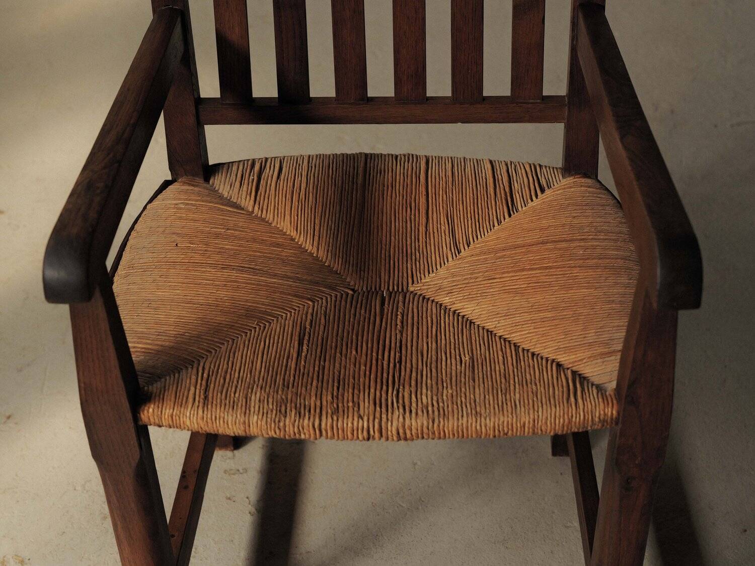 Handcrafted oak and straw armchair, France, circa 1950.