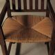 Handcrafted oak and straw armchair, France, circa 1950.