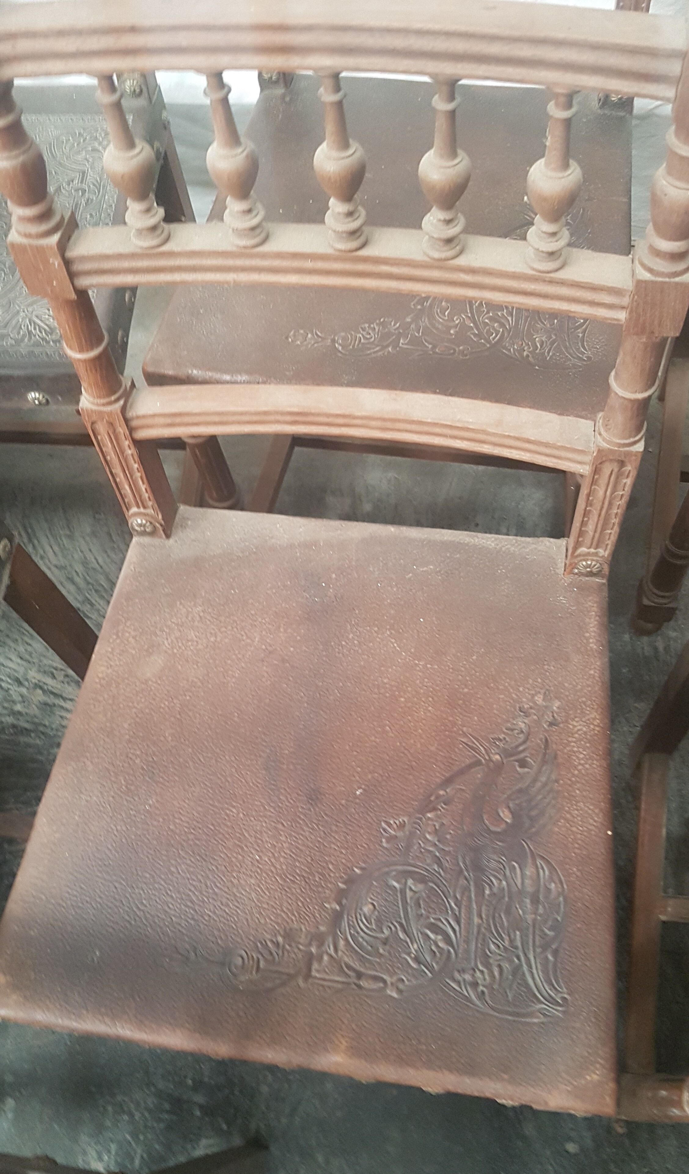 A set of 16 henri 2 style chairs in repelled leather 2 patterns