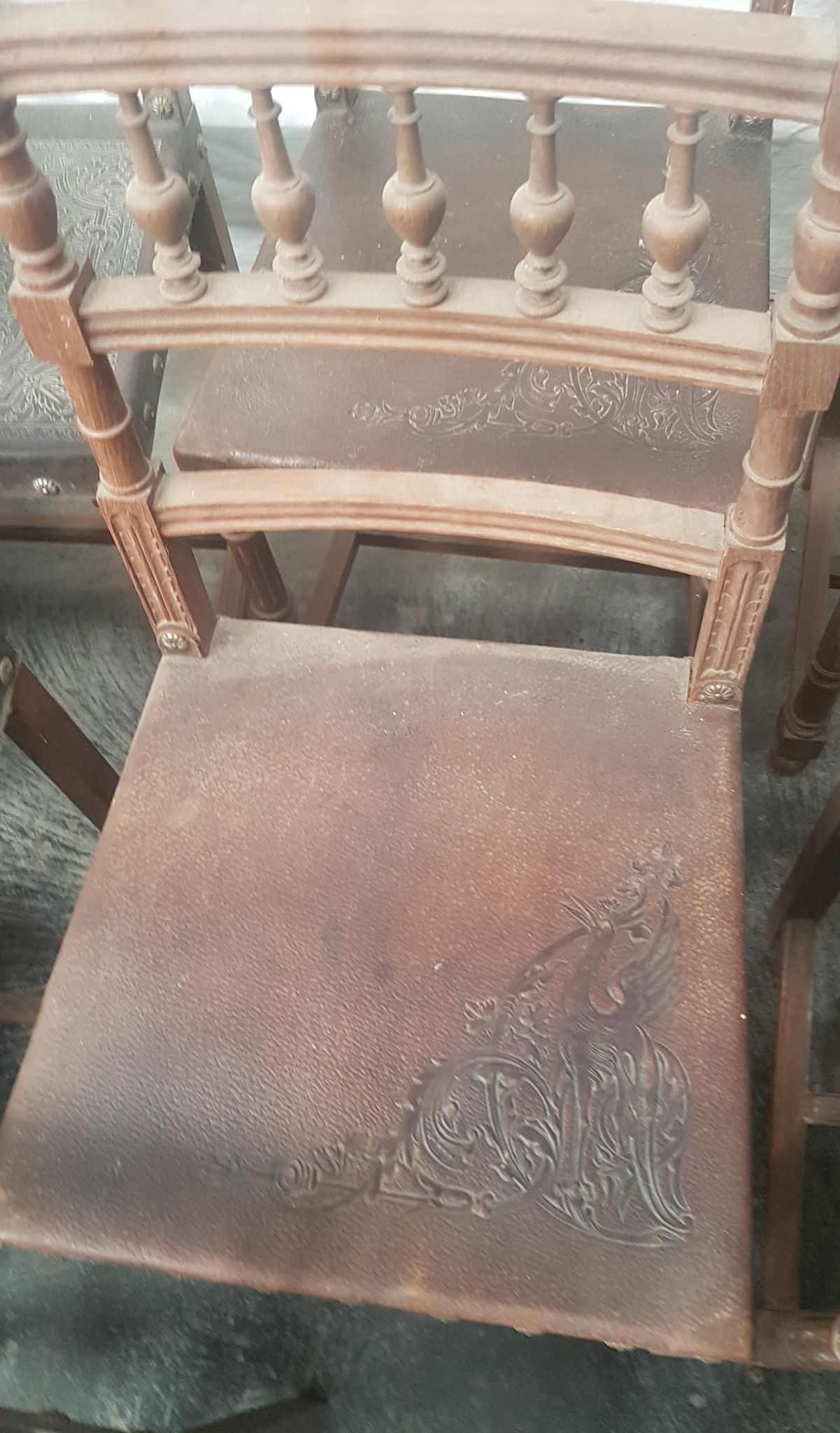 A set of 16 henri 2 style chairs in repelled leather 2 patterns