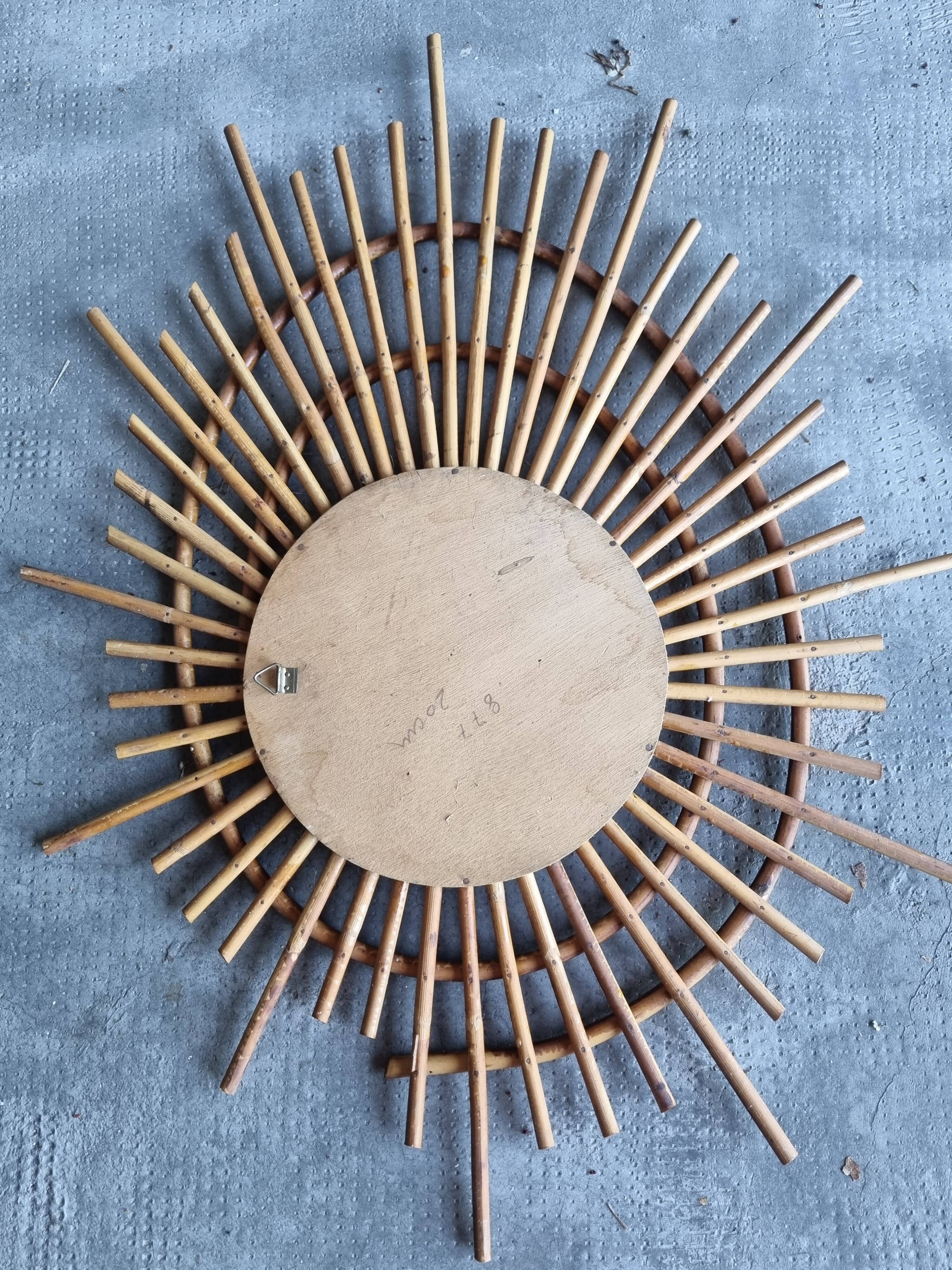 Asymmetrical rattan mirror