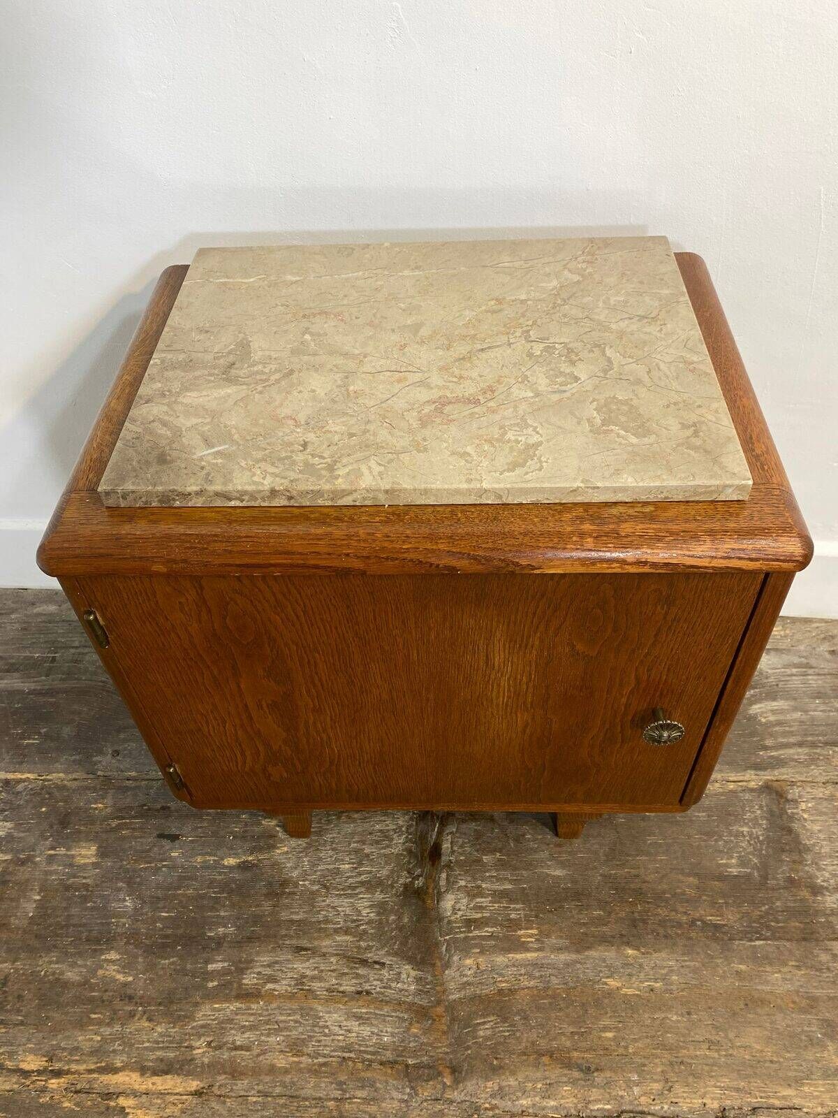 Small wooden piece of furniture with a marble top, 1950s.