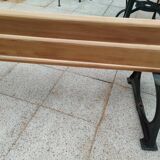 Garden bench with old cast iron legs