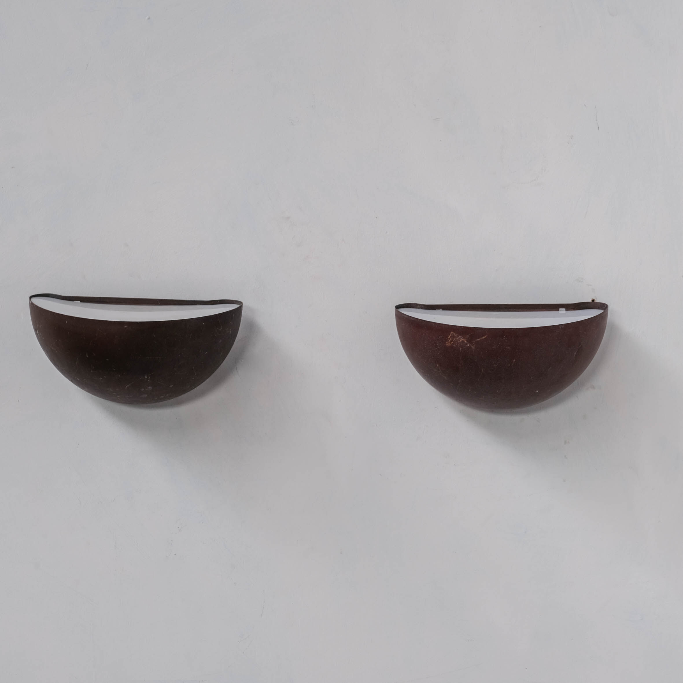 Pair of danish copper patinated wall lights