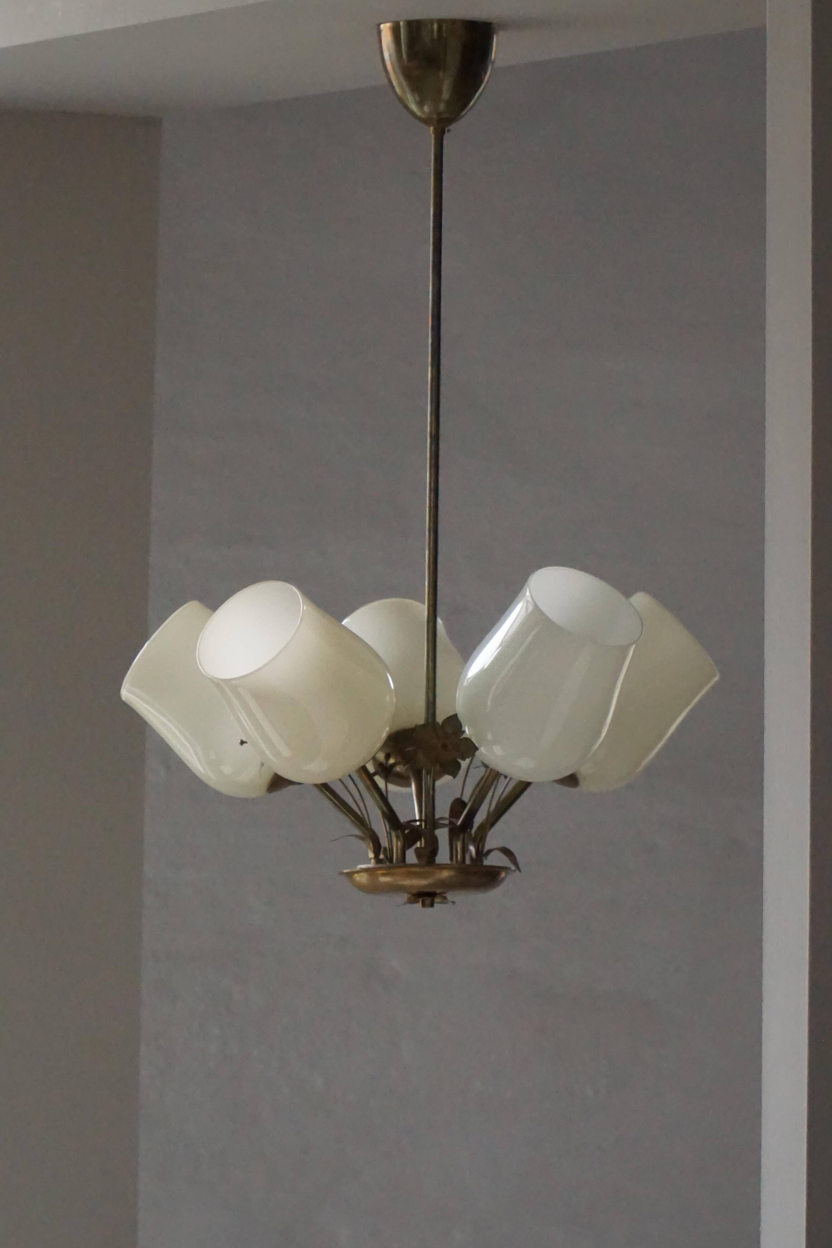 Five-branch brass and glass chandelier by Paavo Tynell for Idman OY Finland, 1940s.