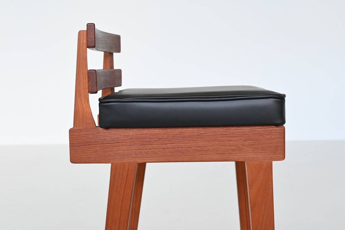 Erik Buck set of three bar stools in teak and leather Dyrlund Denmark 1960