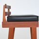 Erik Buck set of three bar stools in teak and leather Dyrlund Denmark 1960