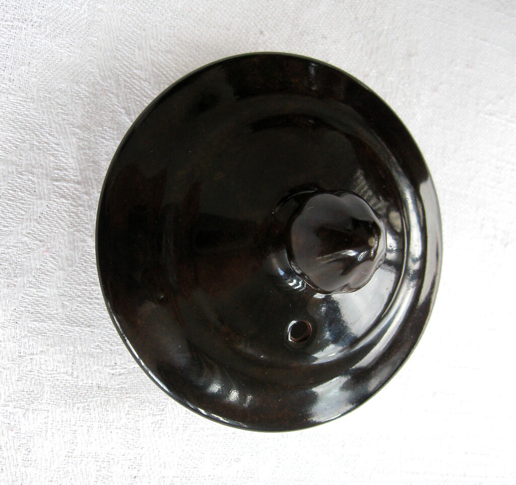 Old brown glazed ceramic coffee pot