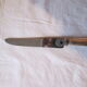 12 silver metal knives