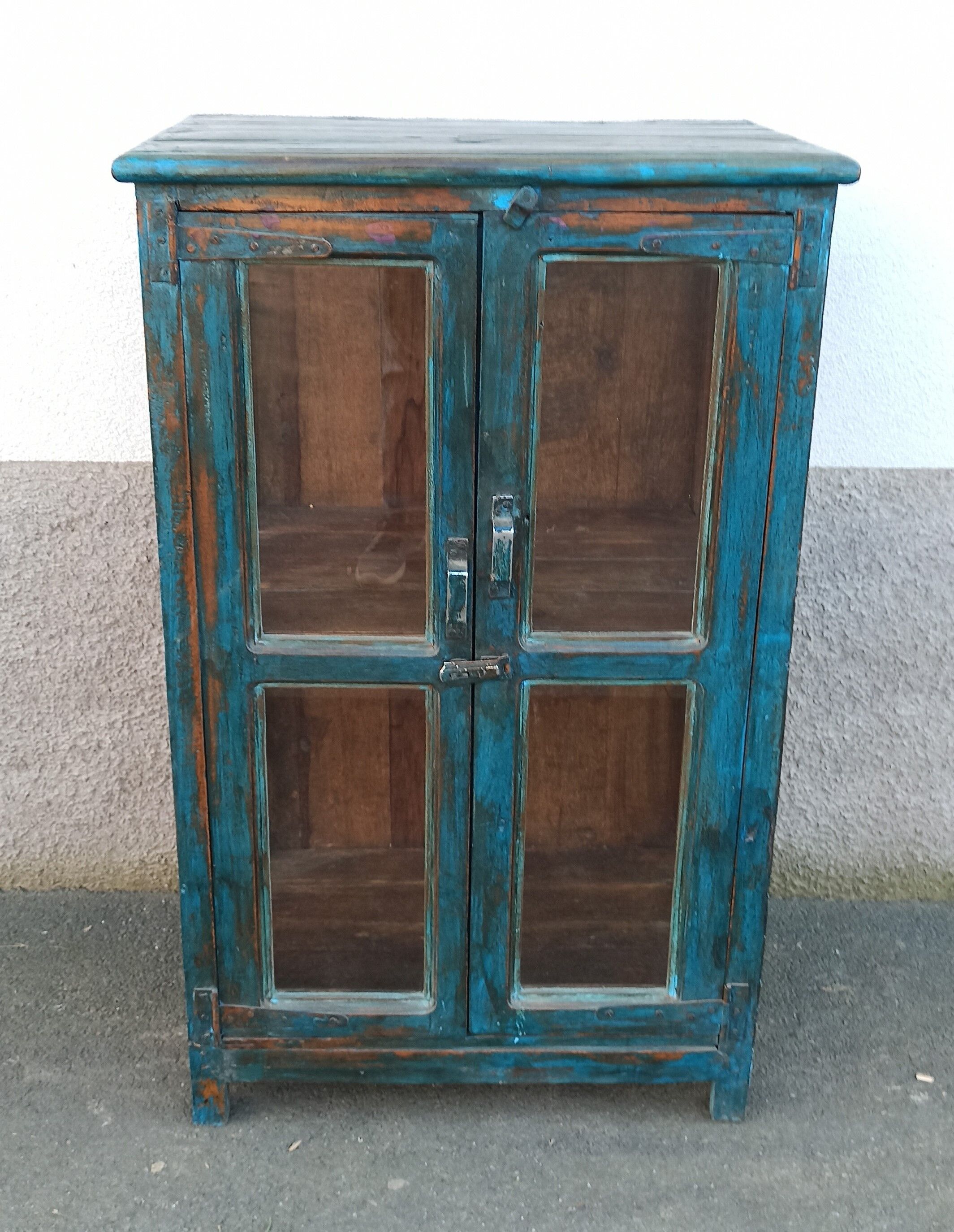Blue wooden showcase