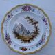 Assiette en faïence émaillée décor polychrome peint à la main