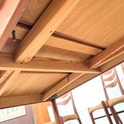 Teak dining table with integrated extensions — Scandinavian
