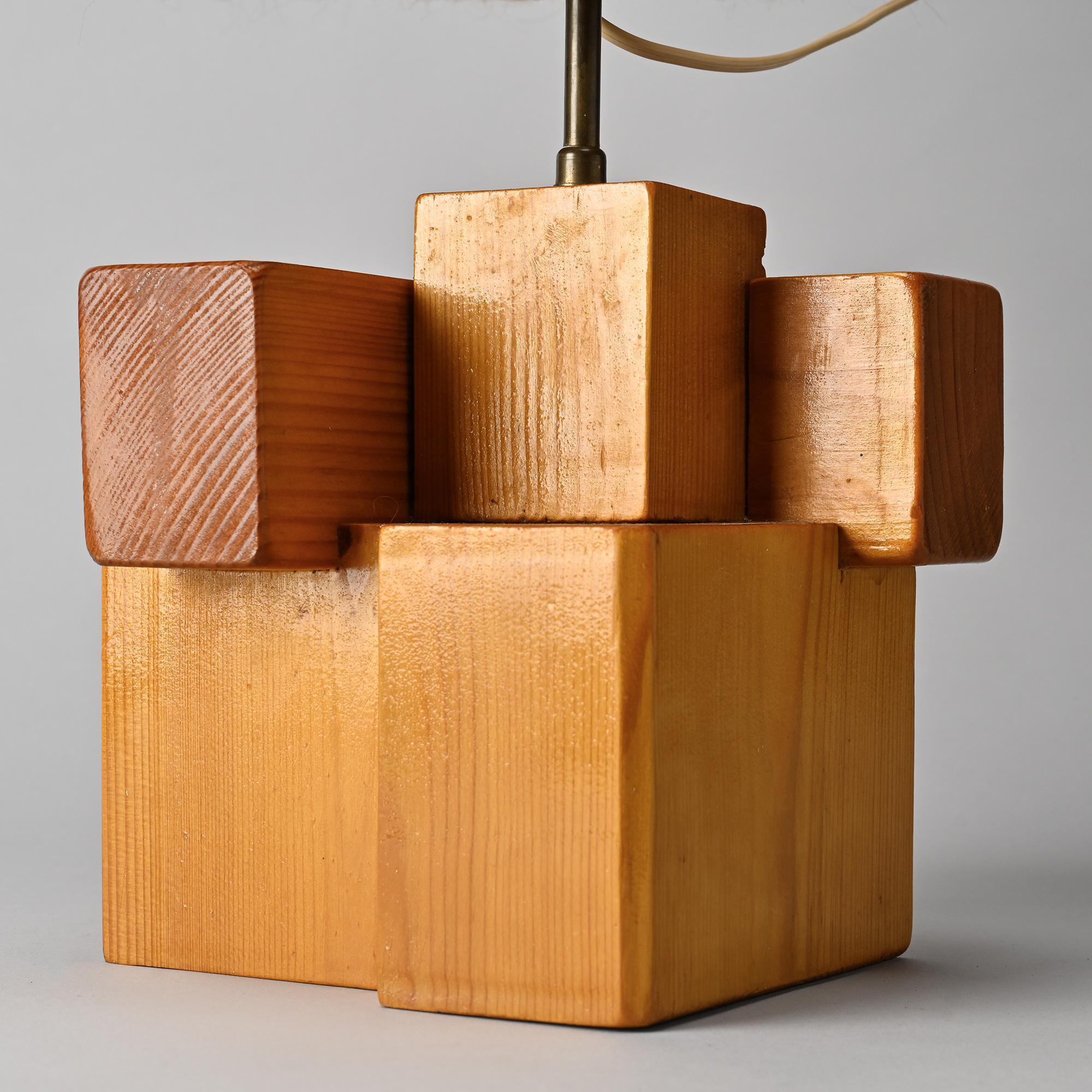 Sculptural table lamp in solid pine, France, circa 1970.