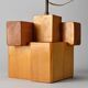 Sculptural table lamp in solid pine, France, circa 1970.