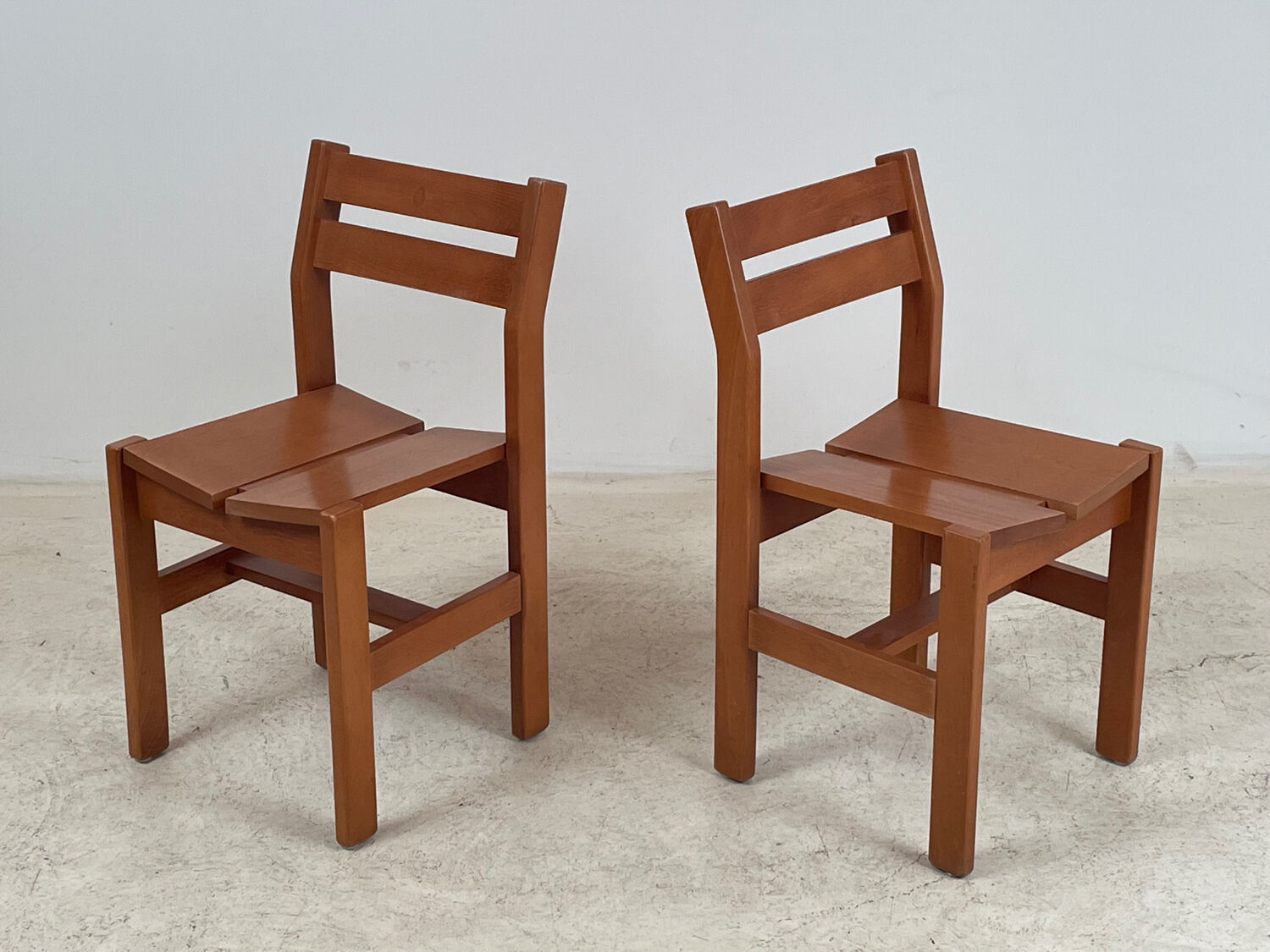 2 Regain chairs for the 1970s arcs.