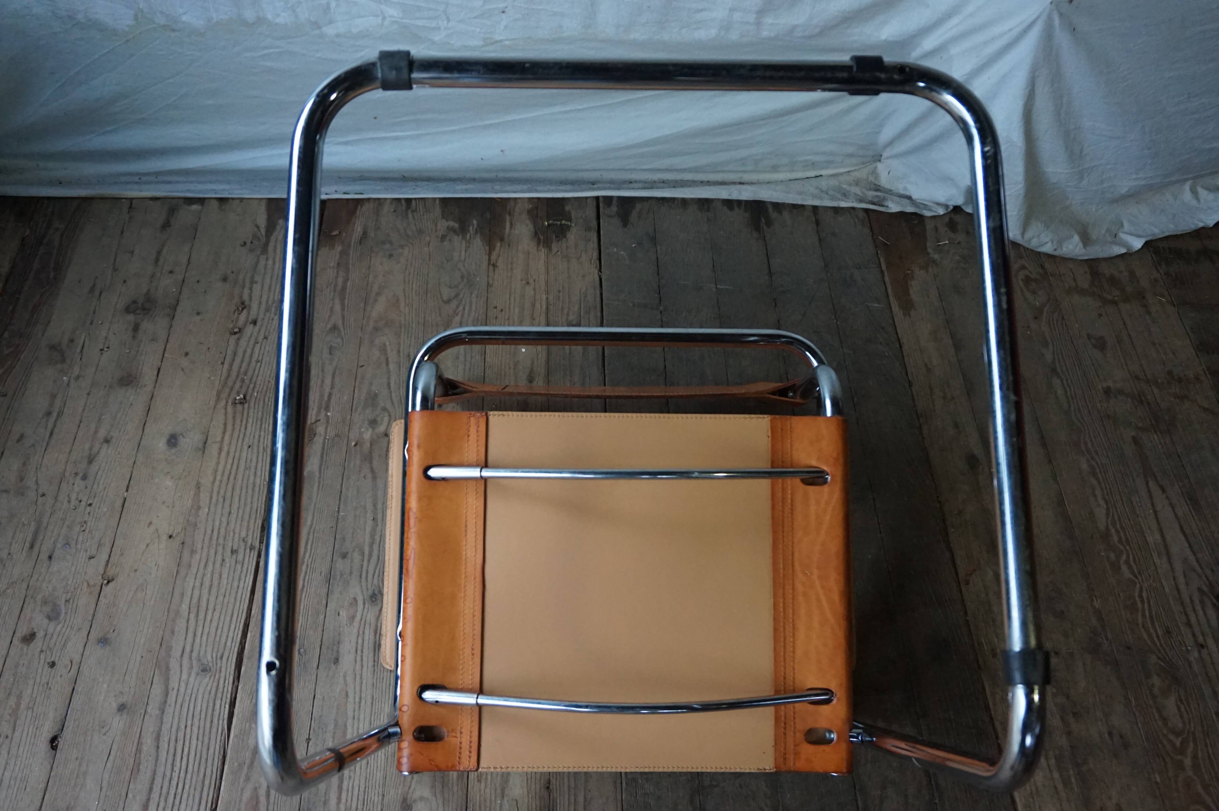 Three  leather armchairs