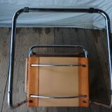 Three  leather armchairs