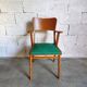 Vintage armchair in skai and wood 60s