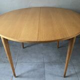 Vintage round table from the 60s with butterfly extension