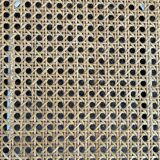 Wooden chair with caning in the style of Marcel Breuer.