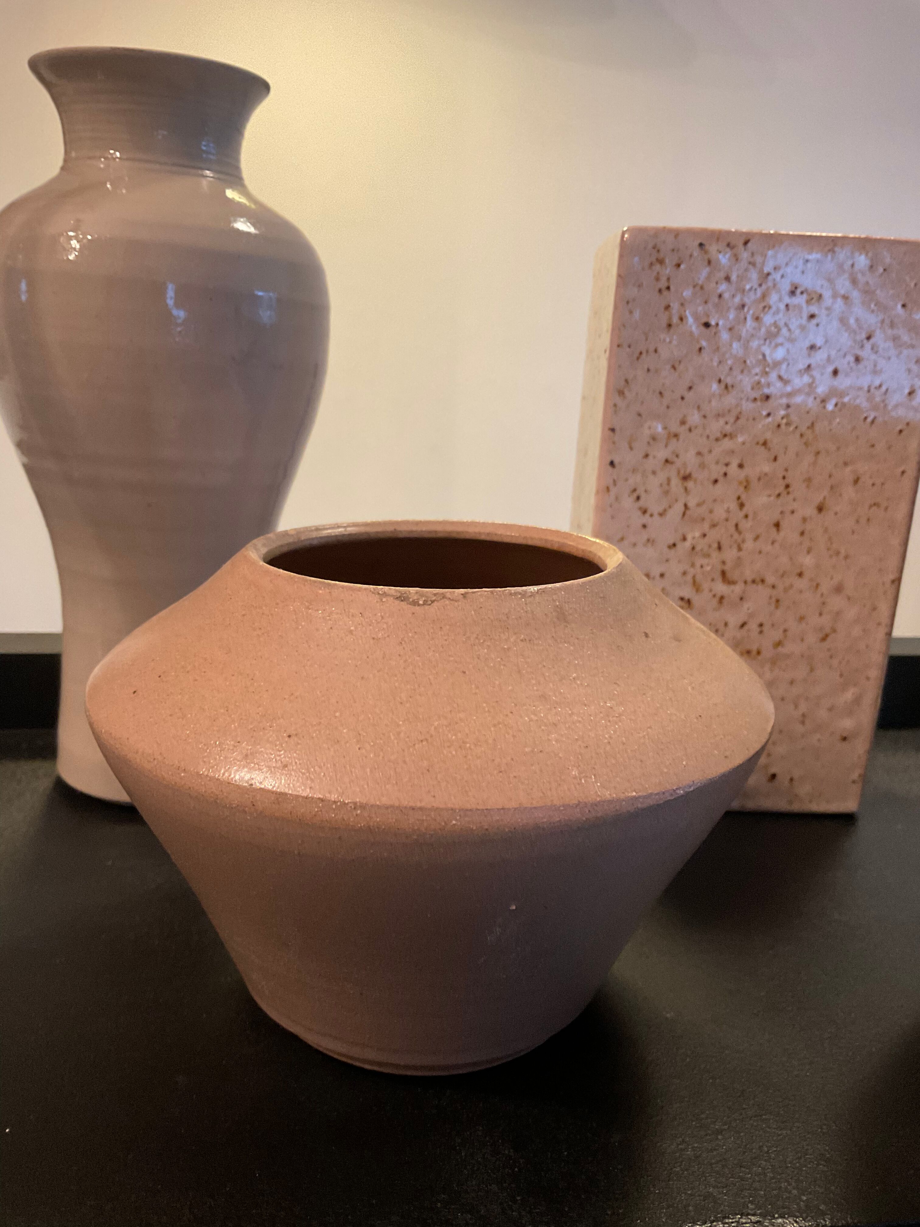 Series of 5 vintage beige ceramic vases