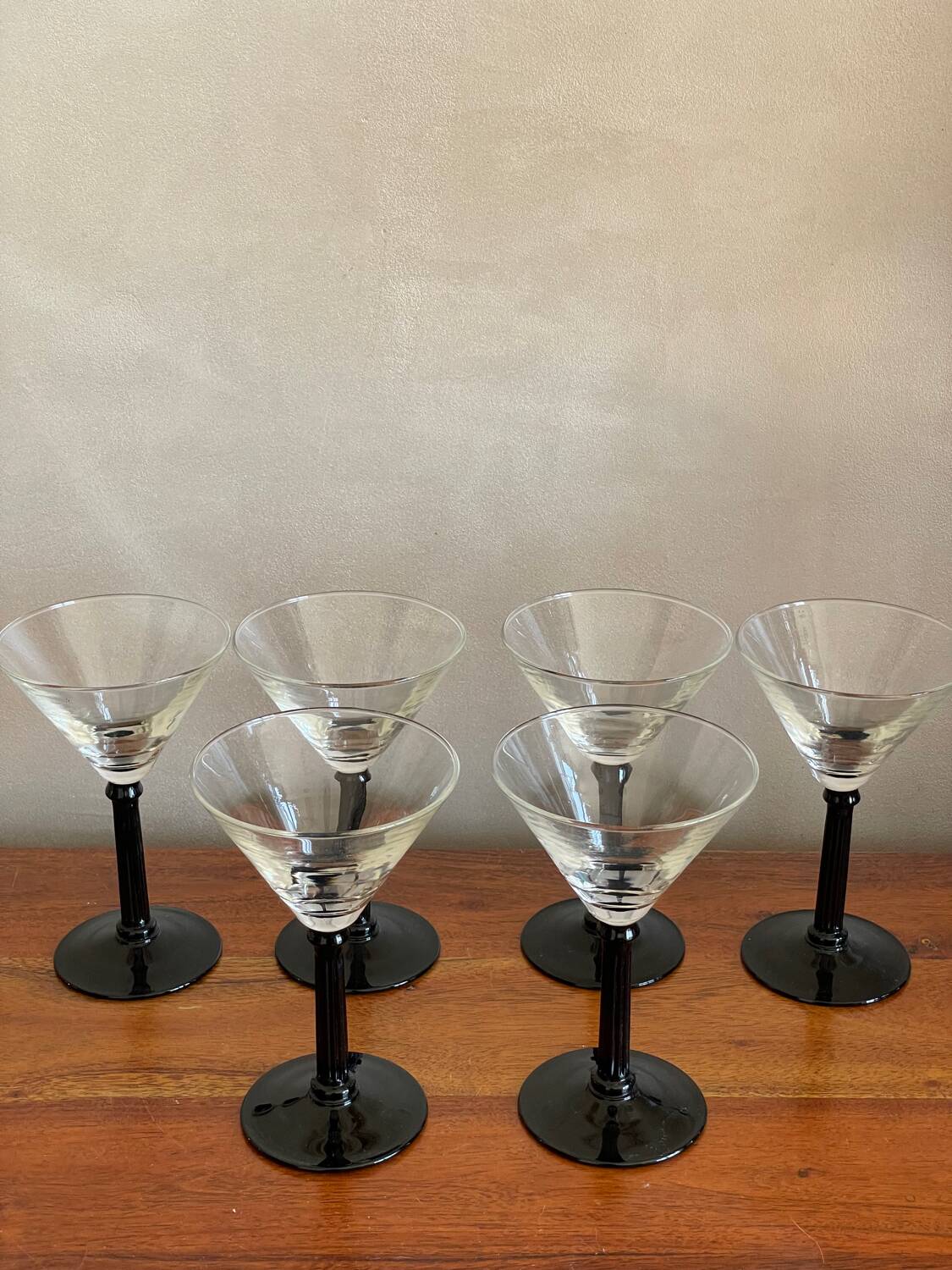 6 black stemmed glasses