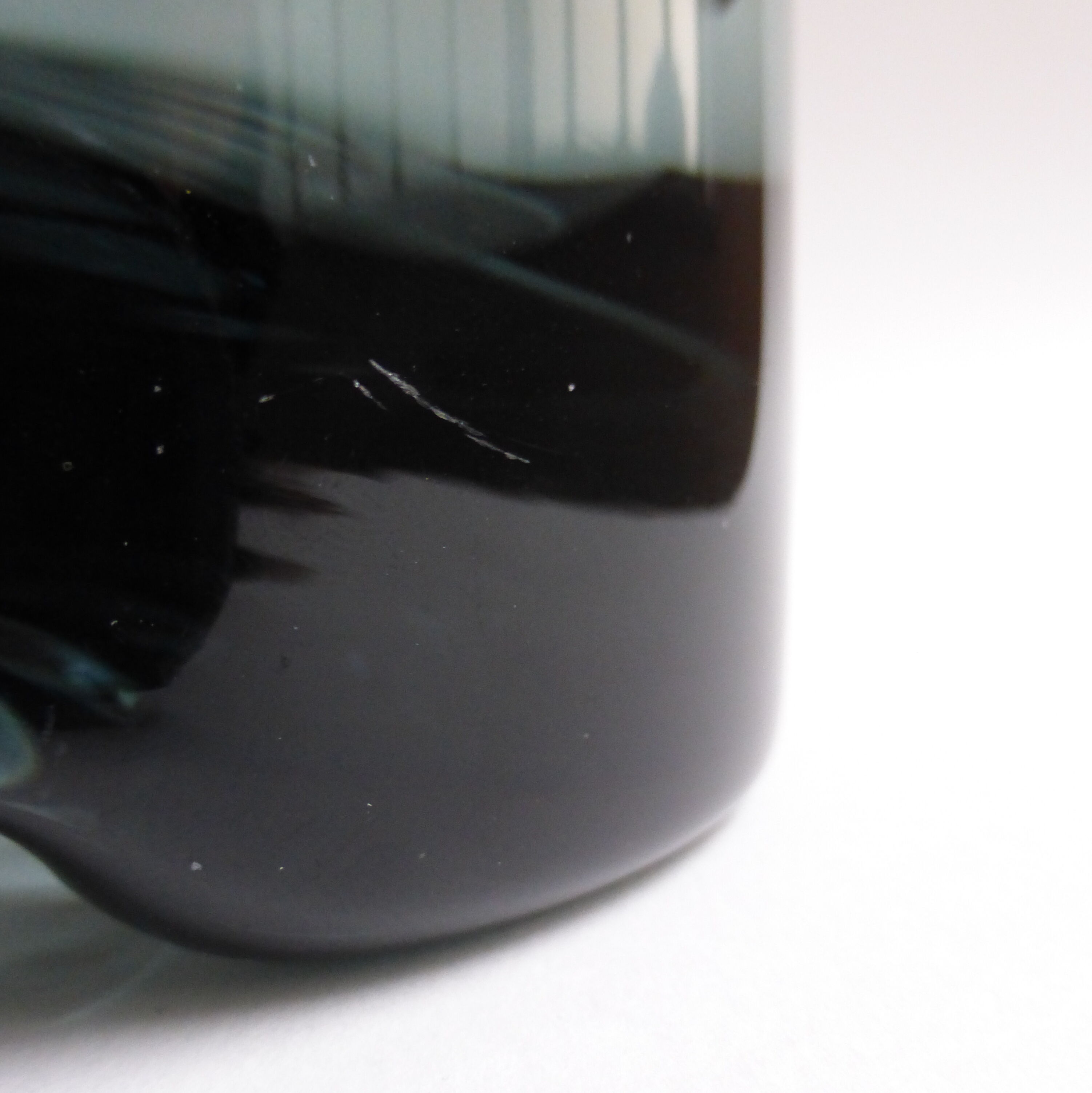 Scandinavian ashtray in 1970's moulded smoked glass
