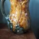 Slip vase with floral decoration