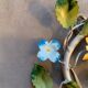 Colorful painted metal floral wall light
