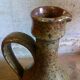 Vintage pottery in sandstone with handles and small beak