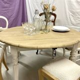 restored raw oak round table from yesteryear