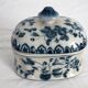 Old porcelain candy box with cracked effect
