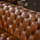 Tan leather tufted Chesterfield sofa