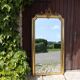 Large gold mirror in Louis XV style