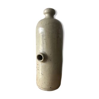 Bottle in sandstone