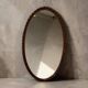 Robust vintage oval wall mirror in wood