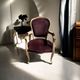 Louis XV style cabriolet armchair in burgundy velvet and carved wood
