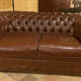 brown leather 2-seater Chesterfield sofa