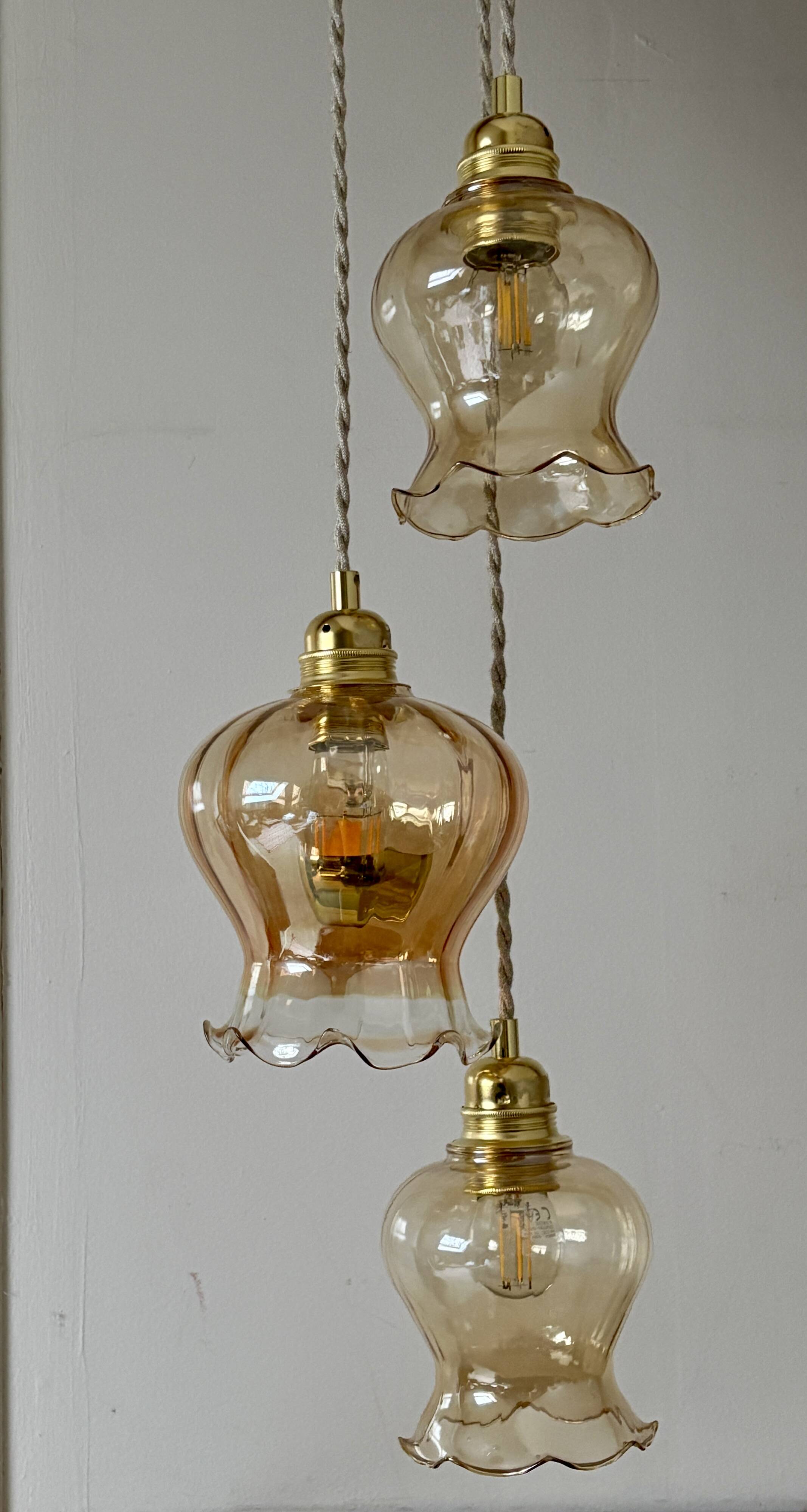 Triple vintage tulip pendant light in amber glass