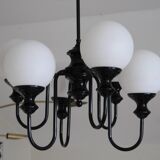Metal chandelier and glass globes