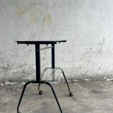 Black brass and glass mid-century trolley with sculptural legs — two-tier vintage bar cart