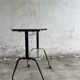 Black brass and glass mid-century trolley with sculptural legs — two-tier vintage bar cart
