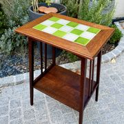 Art Nouveau side table 1910 with double tops in dark oak.