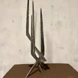 Brutalist candlestick in struck steel