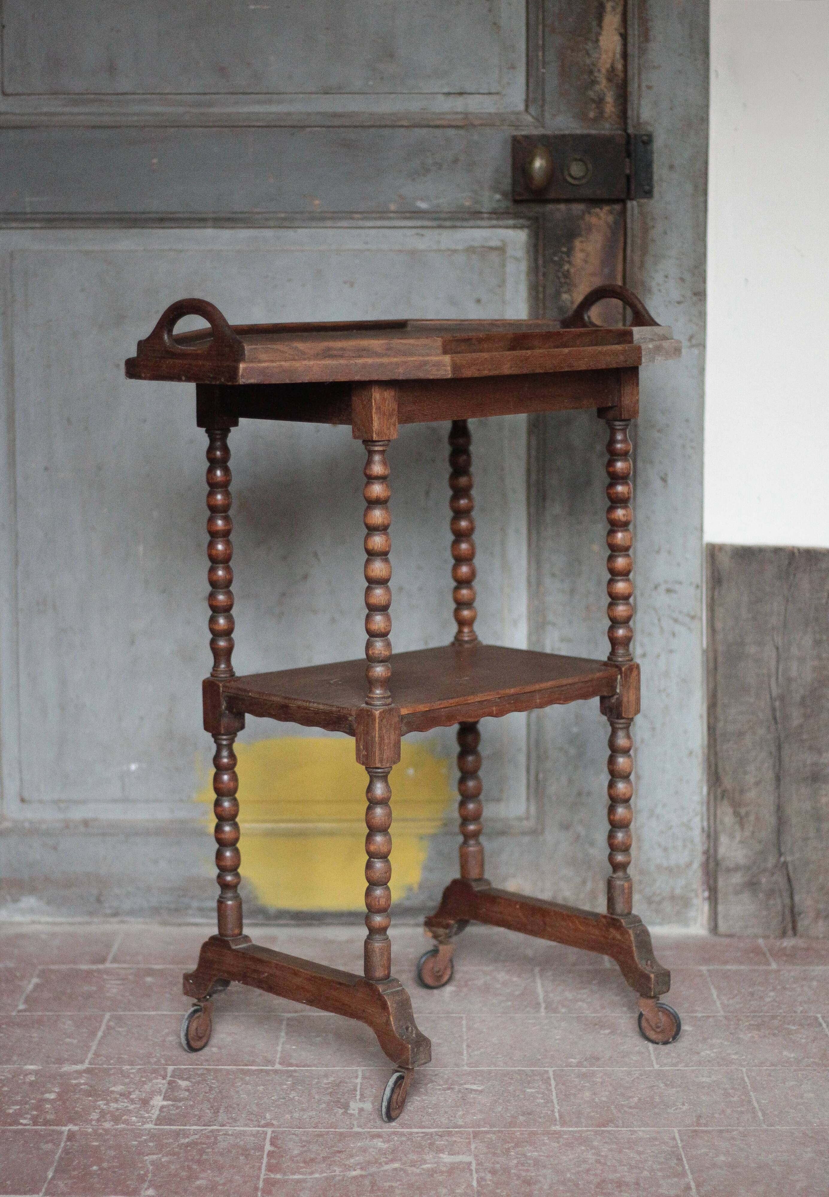 Vintage turned wood dessert trolley, wheeled table with removable top.