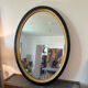 Miroir vintage ovale bois noir et doré