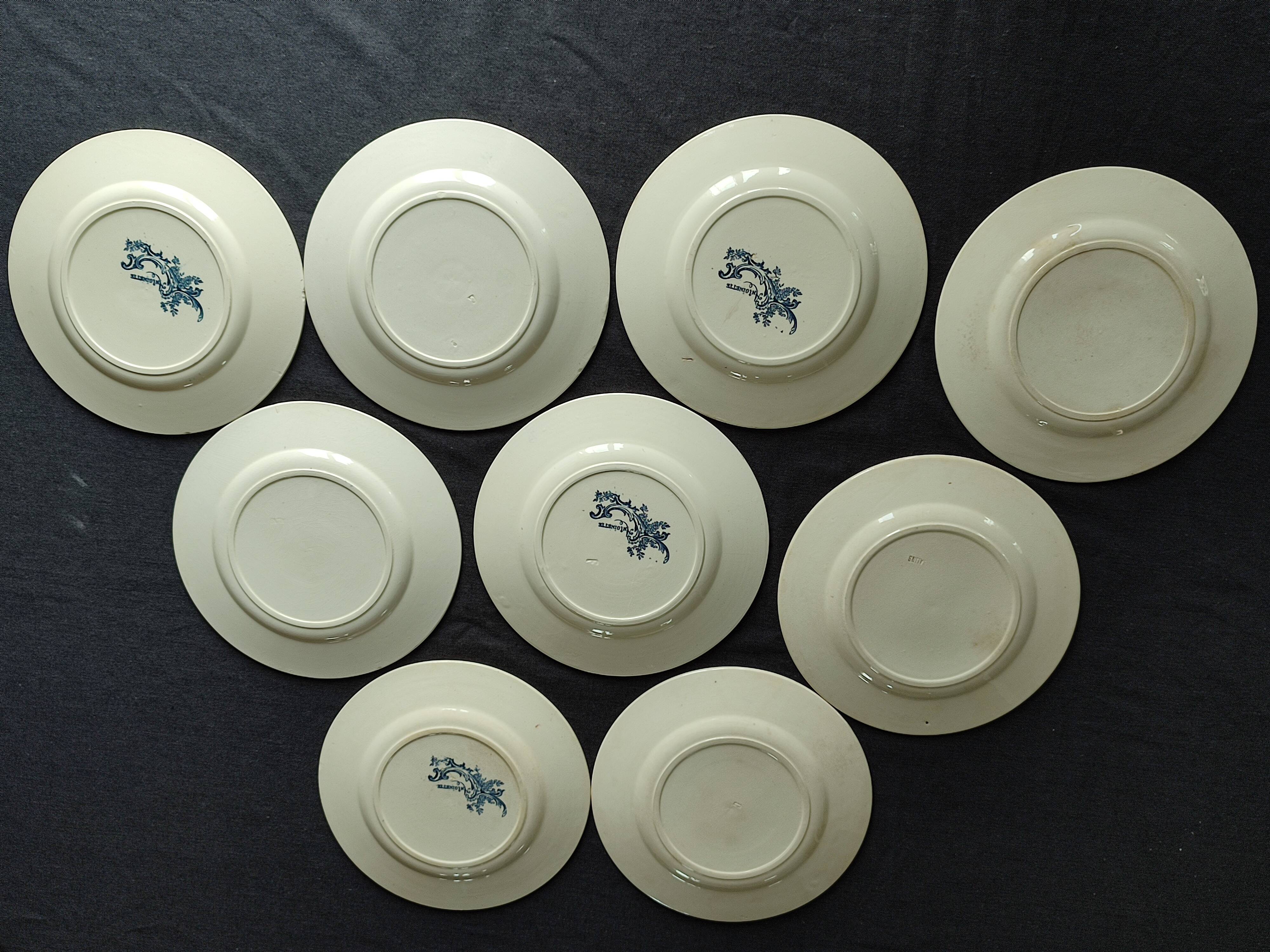 Set of nine antique earthenware, terracotta plates Salins, Antoinette